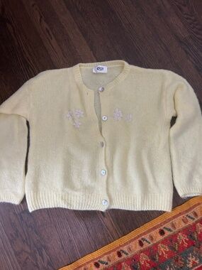 Yellow mohair mix cardigan embellished with white flowers